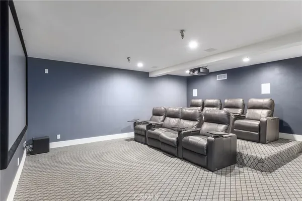 a utility room with sink dryer and washer