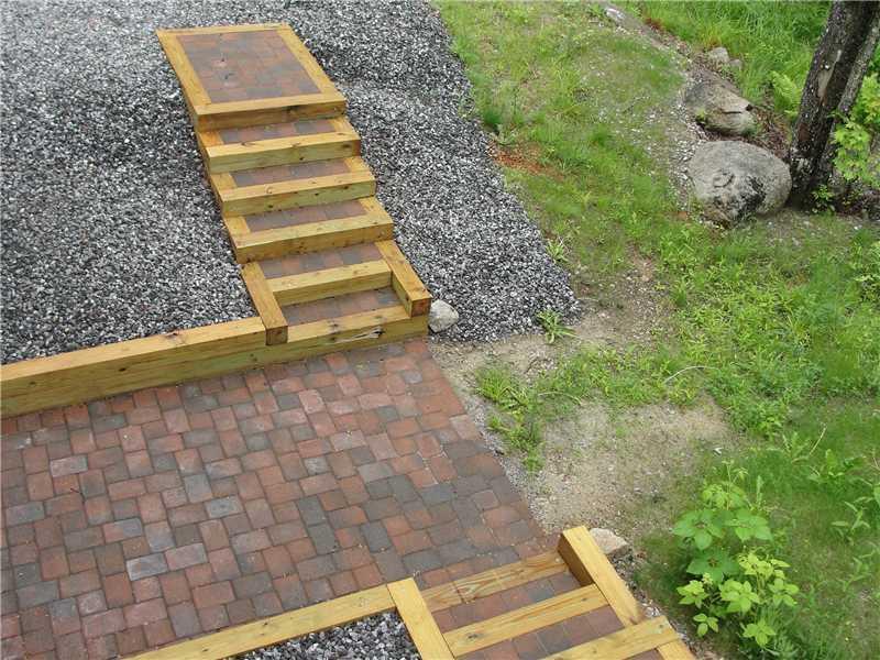8 Hobbs Hill Road Harrison, ME 04040 - Photo 30 of 33 Patio/Deck. Below the back deck, the...