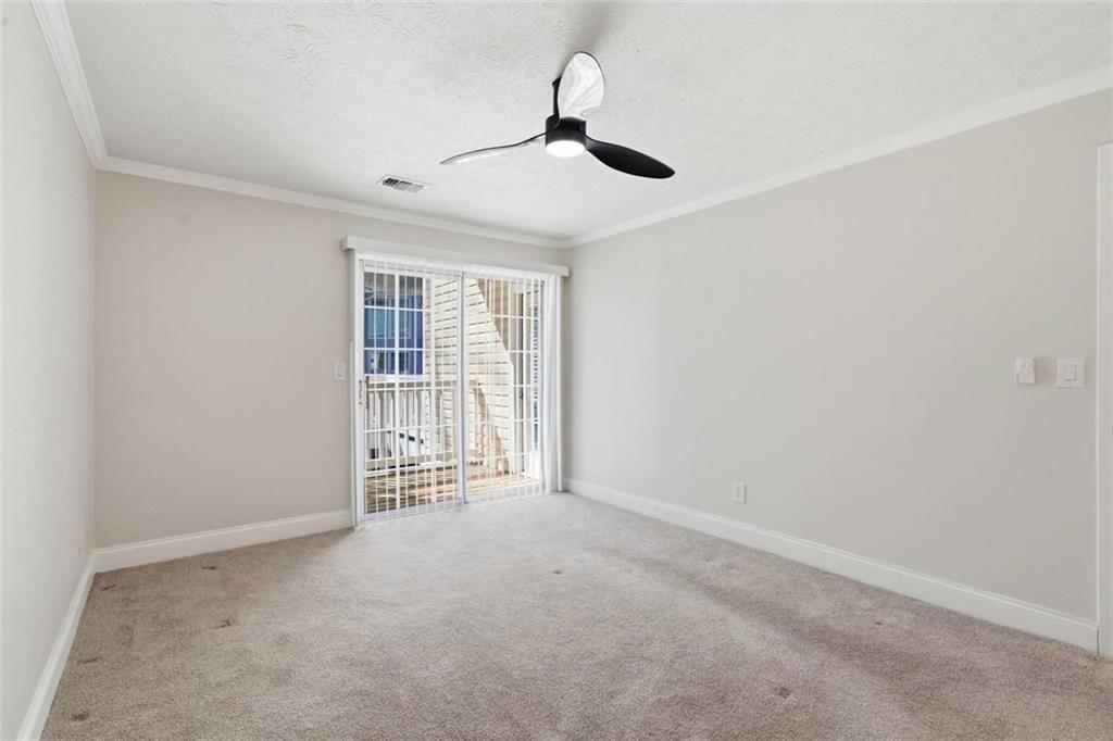 402 Countryside Place, Unit 402 Smyrna, GA 30080 - Photo 33 of 55 a view of an empty room with a window