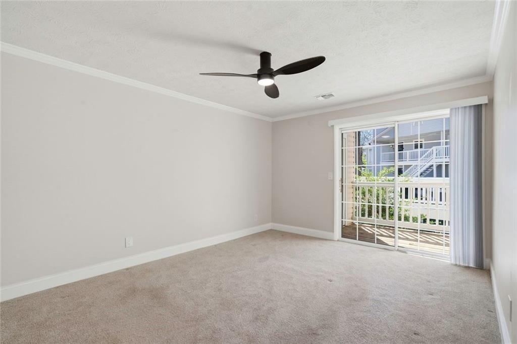 402 Countryside Place, Unit 402 Smyrna, GA 30080 - Photo 35 of 55 an empty room with windows