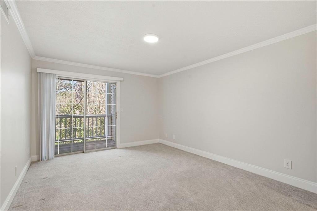 402 Countryside Place, Unit 402 Smyrna, GA 30080 - Photo 37 of 55 an empty room with windows