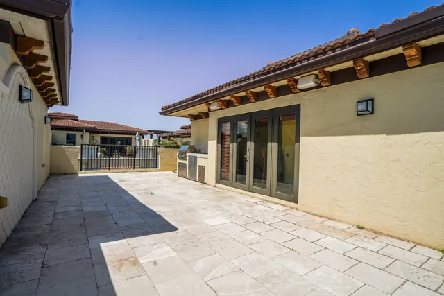 front view of a house with a large window