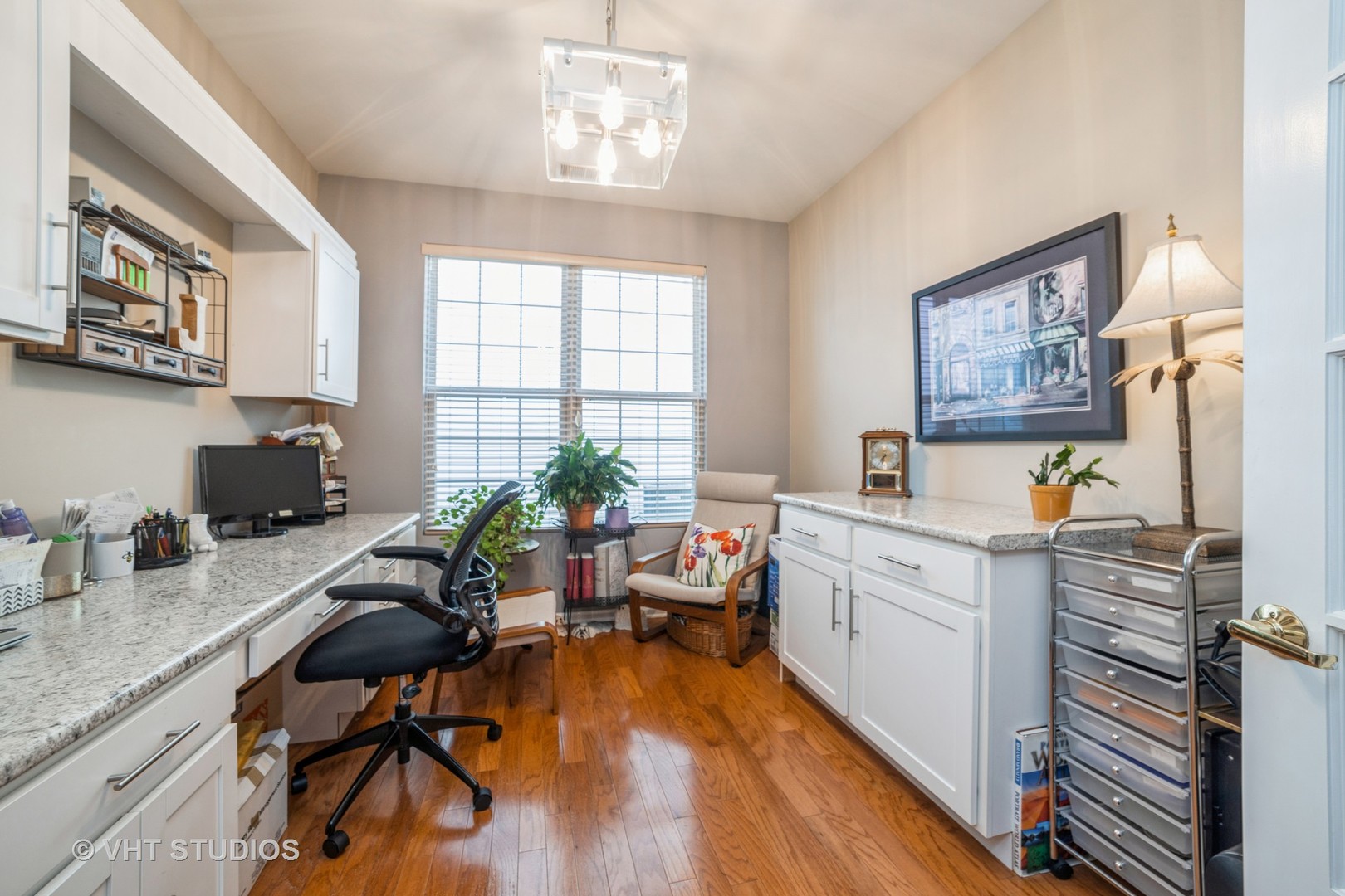 2499 Rolling Ridge Elgin, IL 60124 - Photo 8 of 17 a very nice looking room with kitchen island furniture and a wooden floor