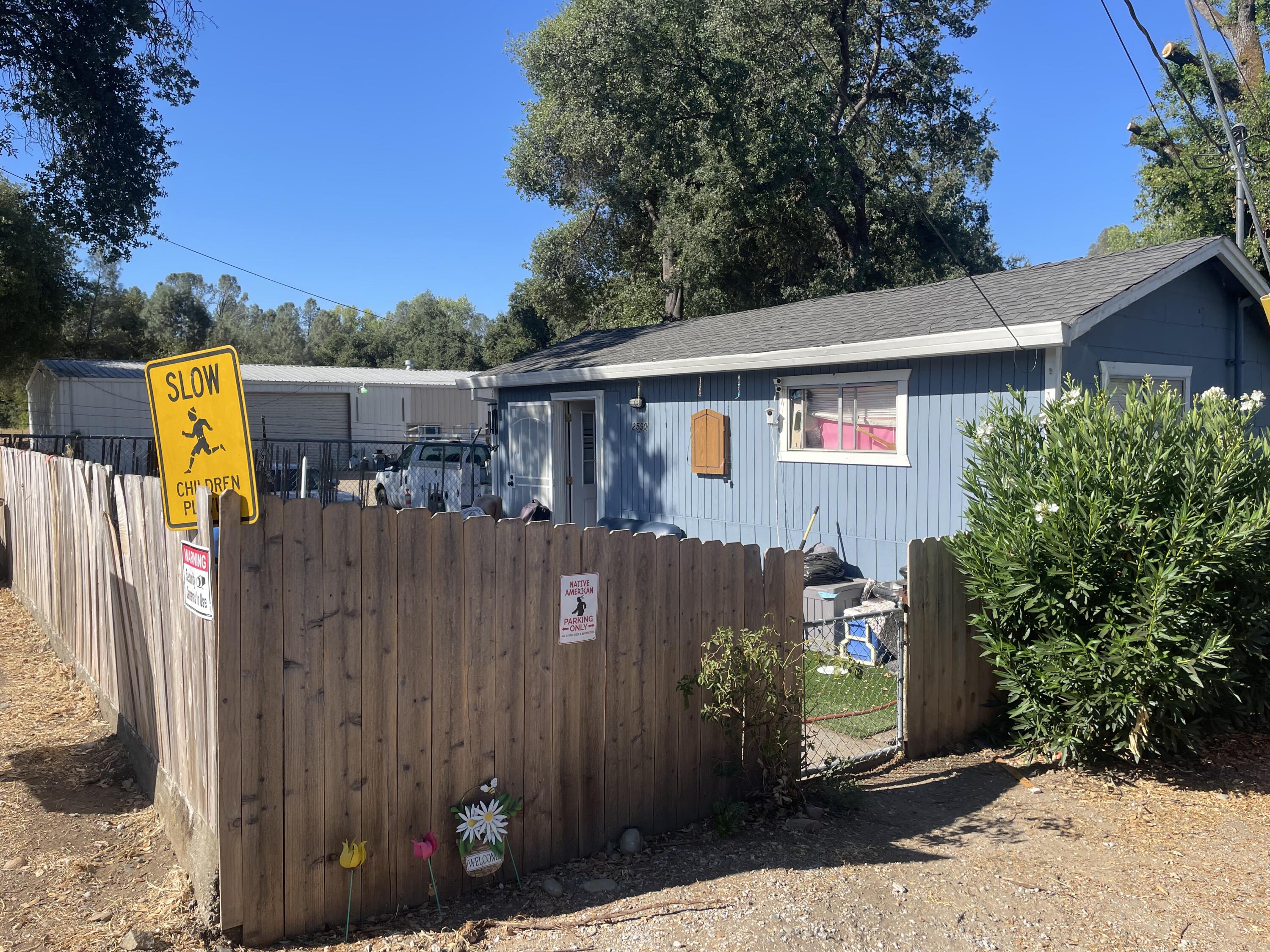 2590 Henderson Road Redding, CA 96002 - Photo 9 of 9 a view of a house with a backyard