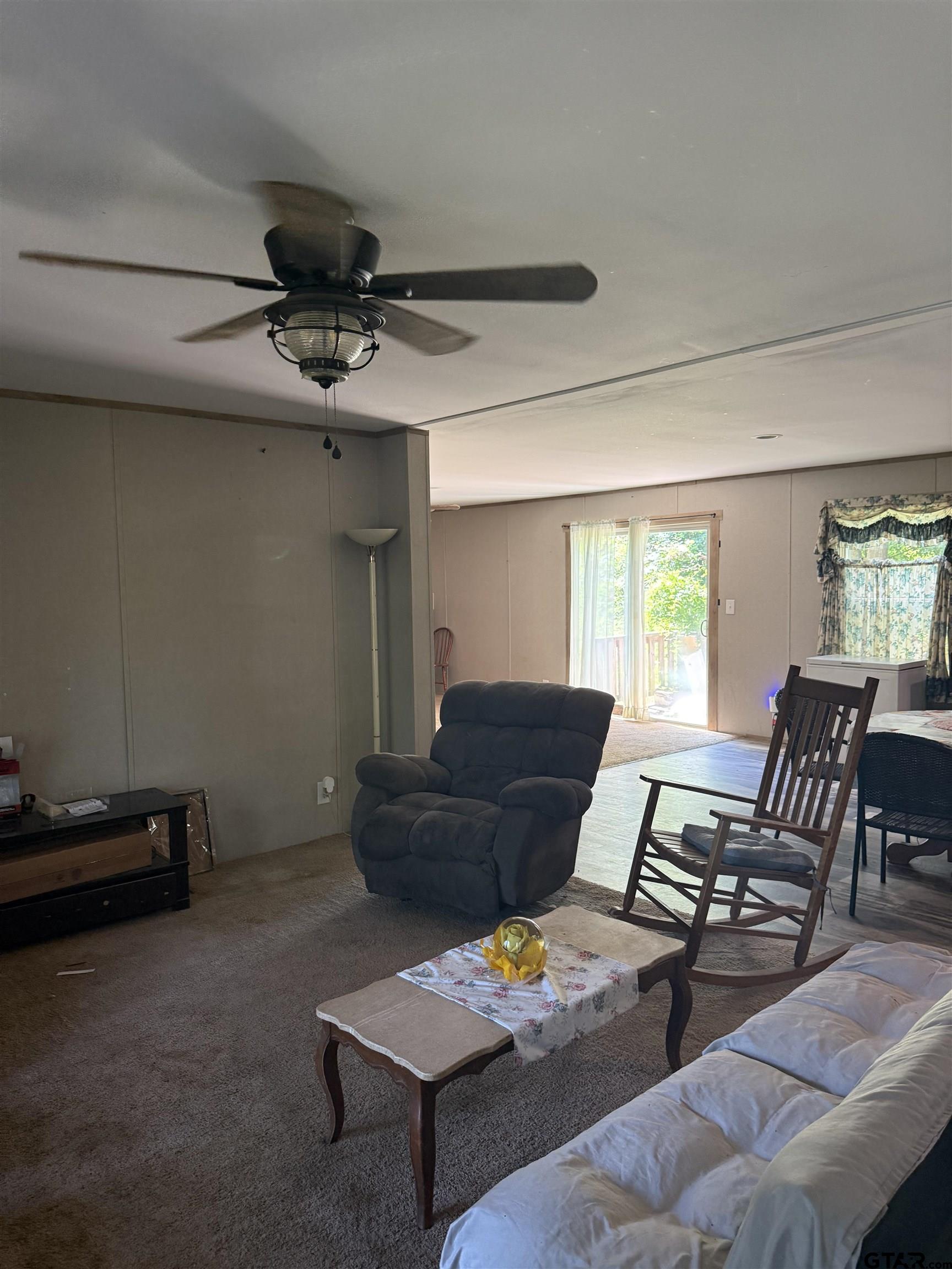 21022 County Road 240 Tyler, TX 75705 - Photo 10 of 13 a living room with furniture and a window