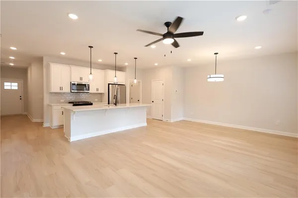 a large kitchen with cabinets