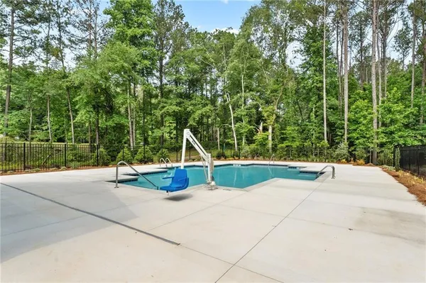 a view of a bench in a backyard