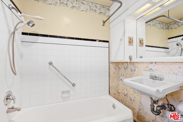a bathroom with a sink and a bathtub