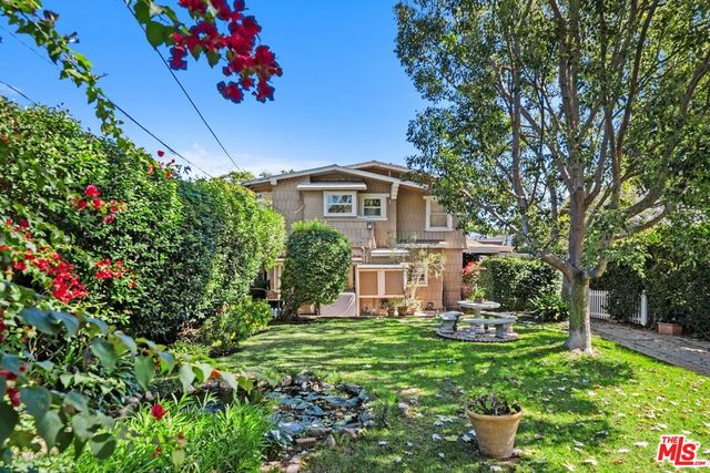 a black and white photo of a refrigerator