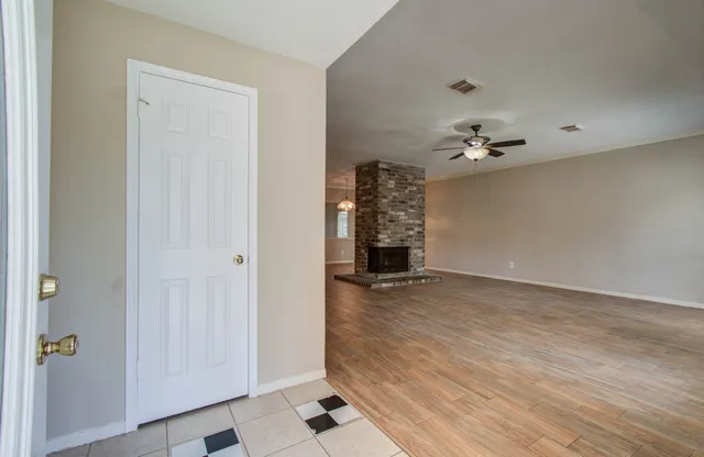 an empty room with windows