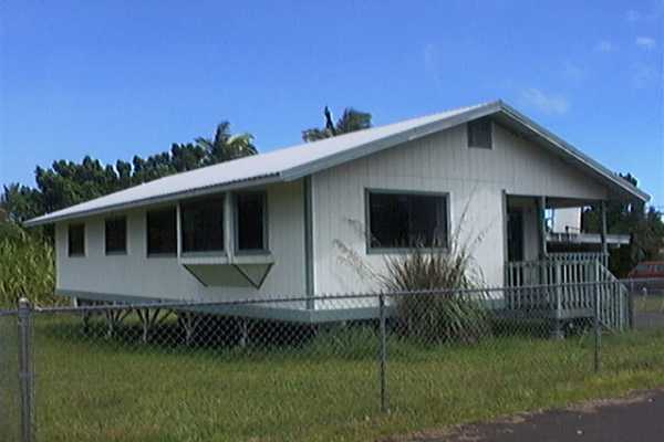 17-4006 Middle Road, Unit 102 Kurtistown, HI 96749 - Photo 14 of 15 a front view of house with yard and green space