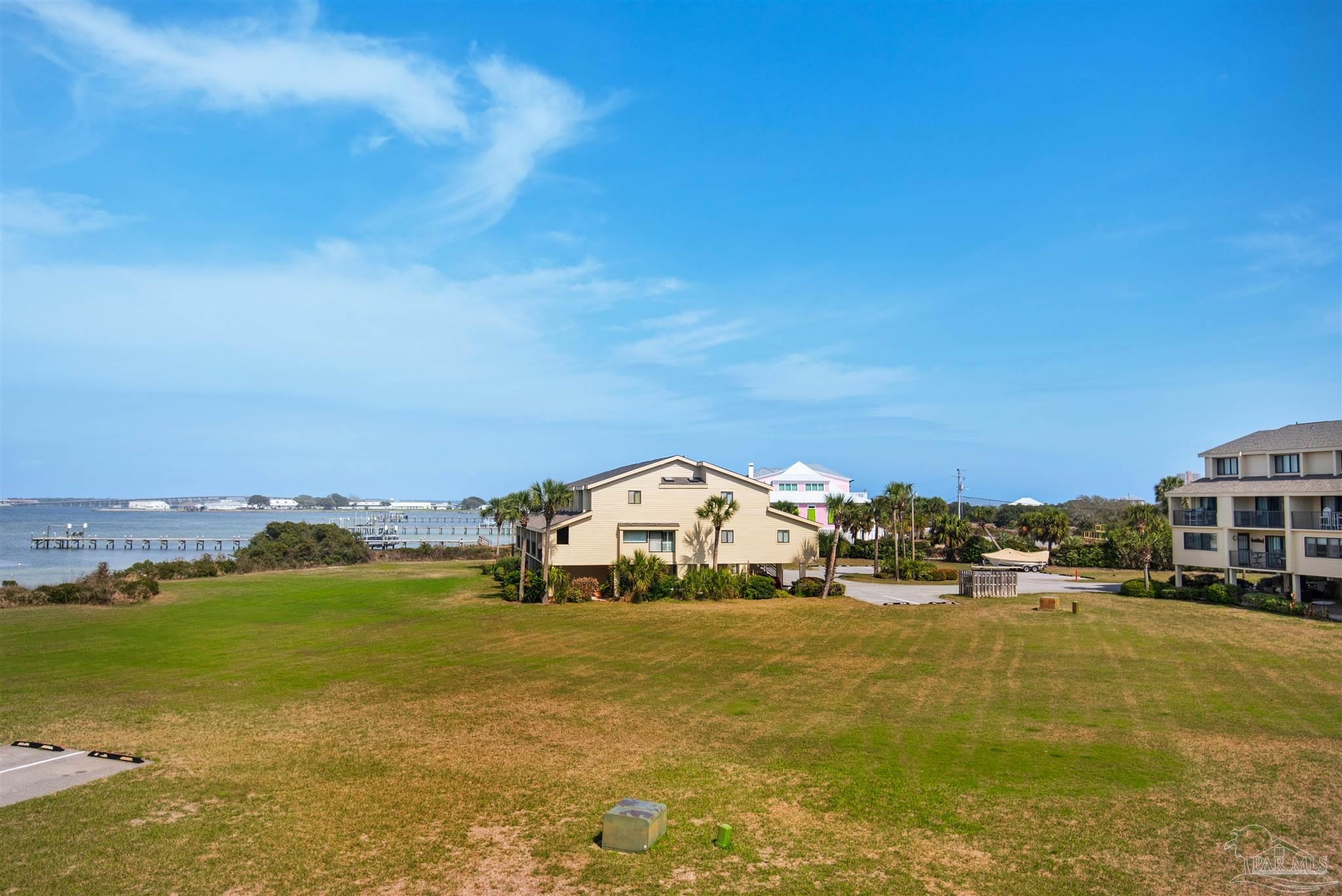 900 Fort Pickens Road, Unit 425 Pensacola Beach, FL 32561 - Photo 32 of 47 a view of houses with outdoor space