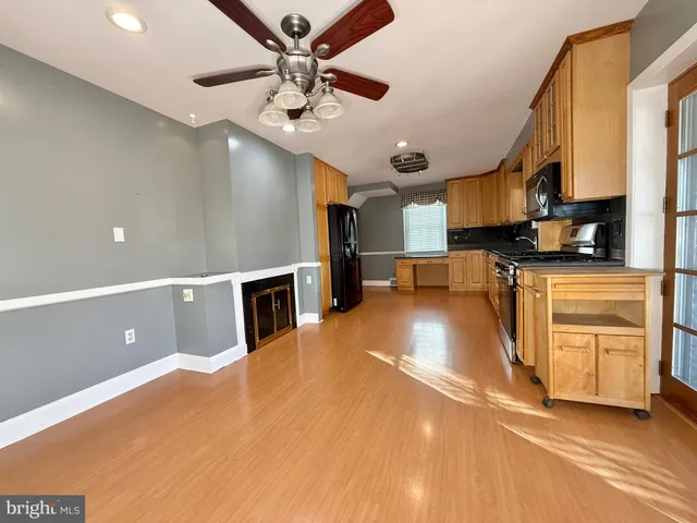 a view of a kitchen with a sink cabinets and window