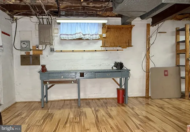 a view of a wooden house with a yard