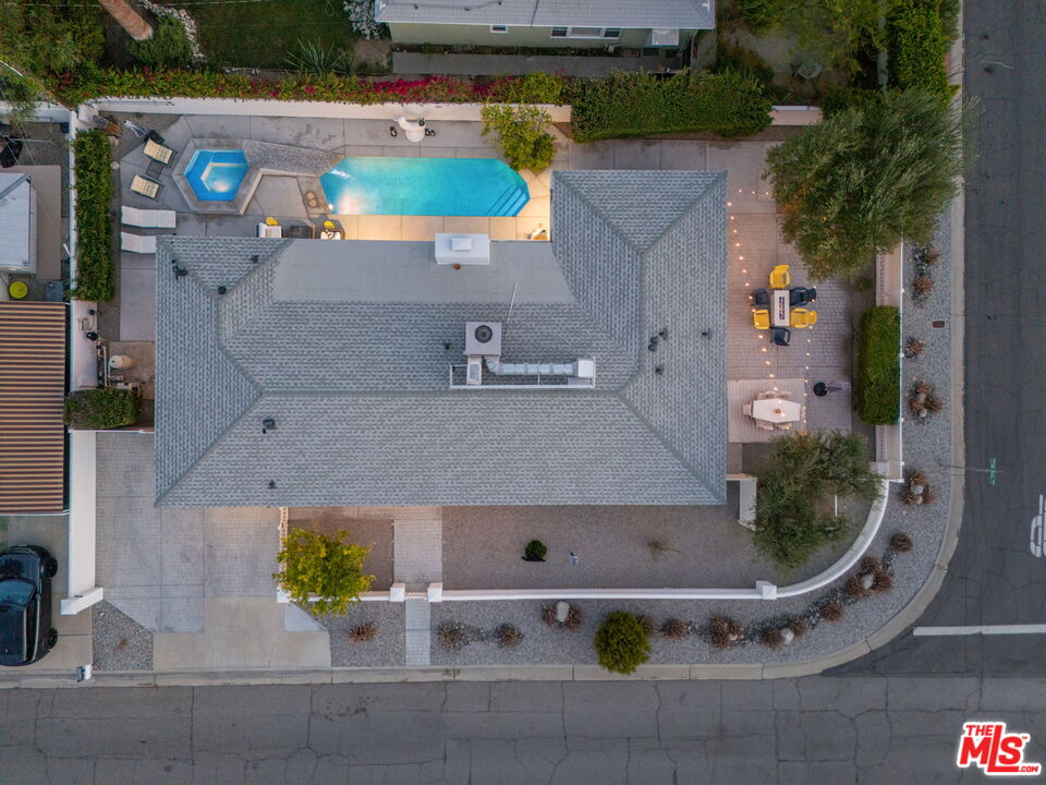 1399 Tamarisk Road Palm Springs, CA 92262 - Photo 26 of 28 an aerial view of a house with a swimming pool