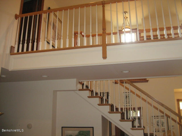310 Dalton Division Road Pittsfield, MA 01201 - Photo 22 of 39 Living room view to Upstairs balcony