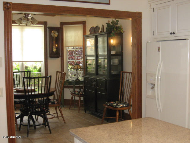 310 Dalton Division Road Pittsfield, MA 01201 - Photo 6 of 39 view to dining room from kitchen
