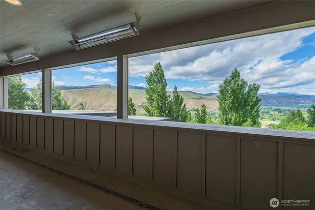 a view of empty room with sliding door