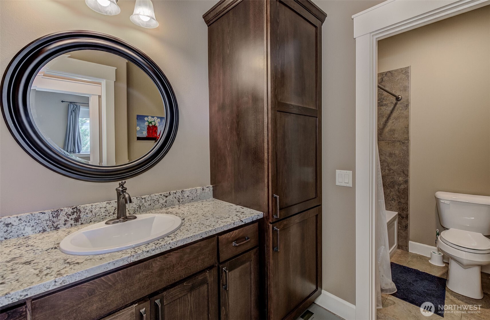 1400 Westpoint Place Wenatchee, WA 98801 - Photo 29 of 36 a bathroom with a sink and a mirror