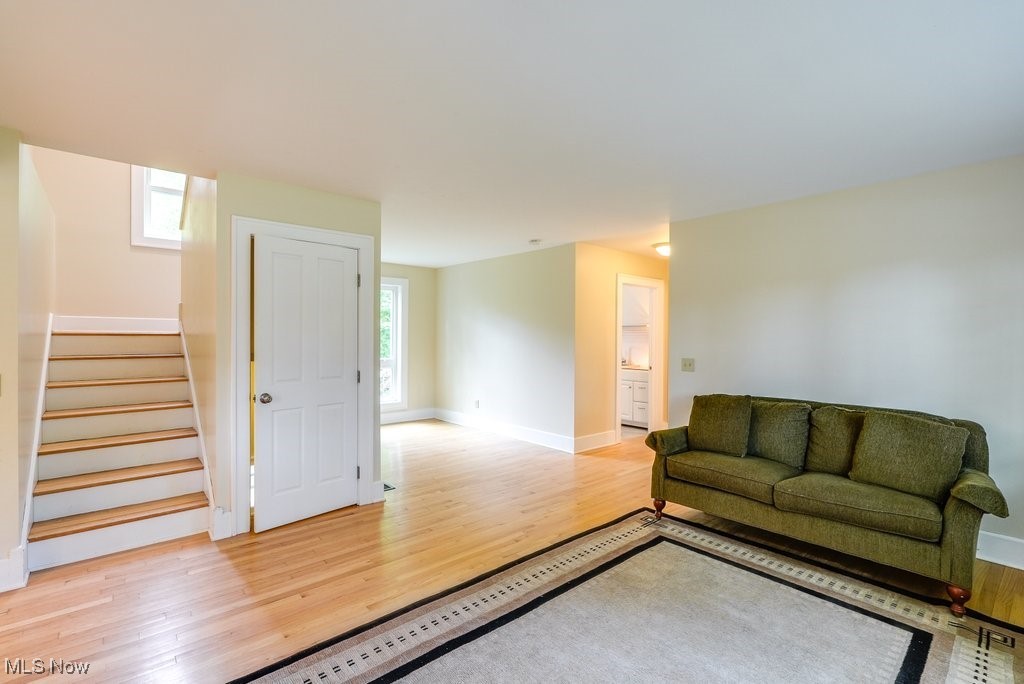 2980 Luli Road Mogadore, OH 44260 - Photo 27 of 50 Living room featuring light hardwood / wood-style flooring and a wealth of natural light