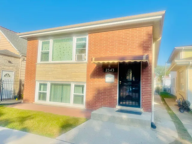 a view of a house with a large window