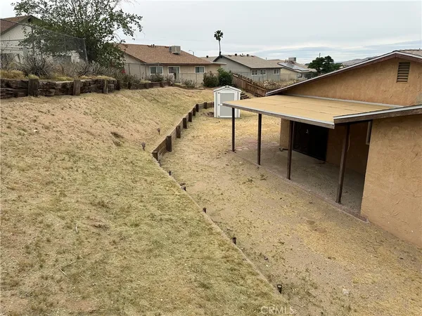 a view of house with outdoor space