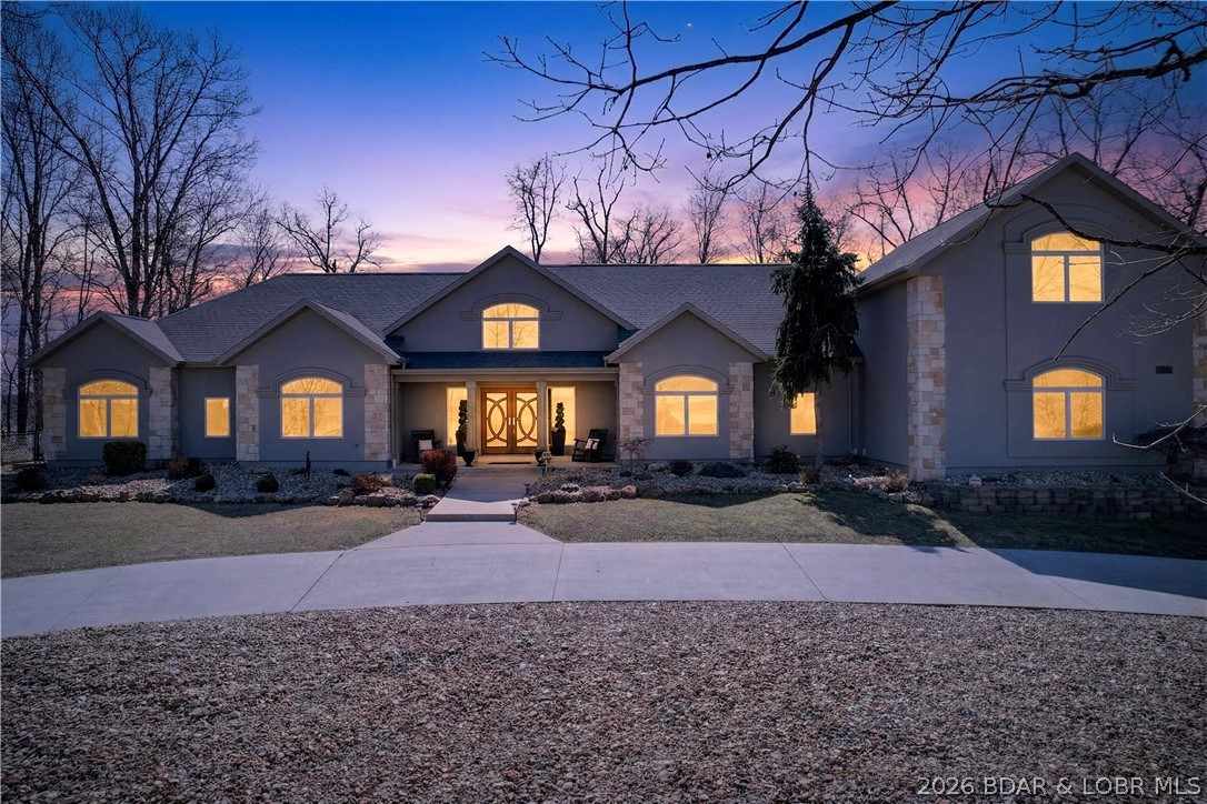 890 Anemone Road Lake Ozark, MO 65049 - Photo 1 of 63 Digitally enhanced sky and lights