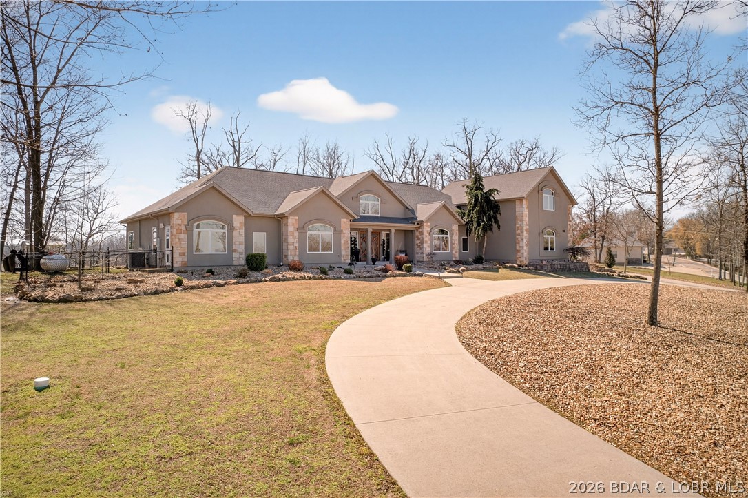 890 Anemone Road Lake Ozark, MO 65049 - Photo 2 of 63 Front of home, circle drive