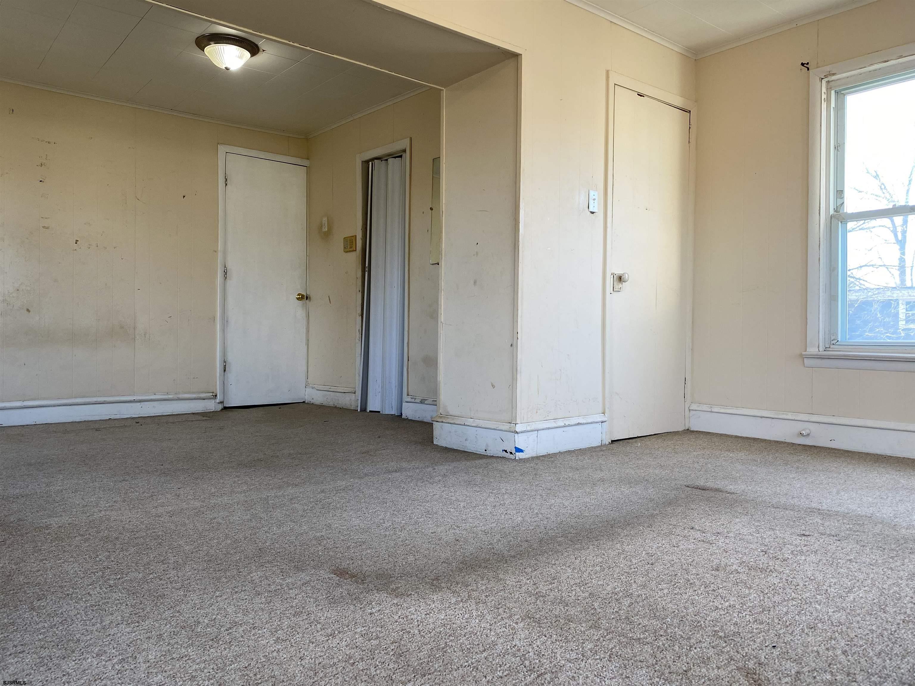 137 West Edgewater Avenue Pleasantville, NJ 08232 - Photo 25 of 36 a view of an empty room and a window