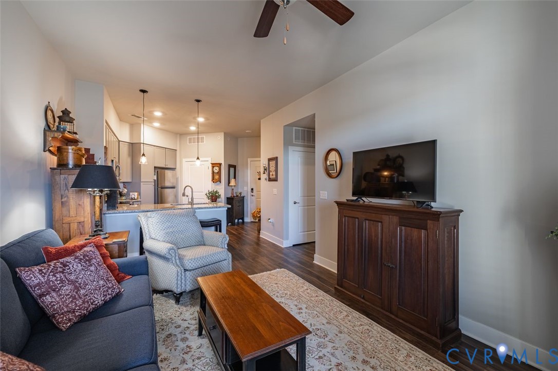 10521 Stony Bluff Drive, Unit 402 Ashland, VA 23005 - Photo 15 of 45 Living area with dark wood-type flooring, ceiling