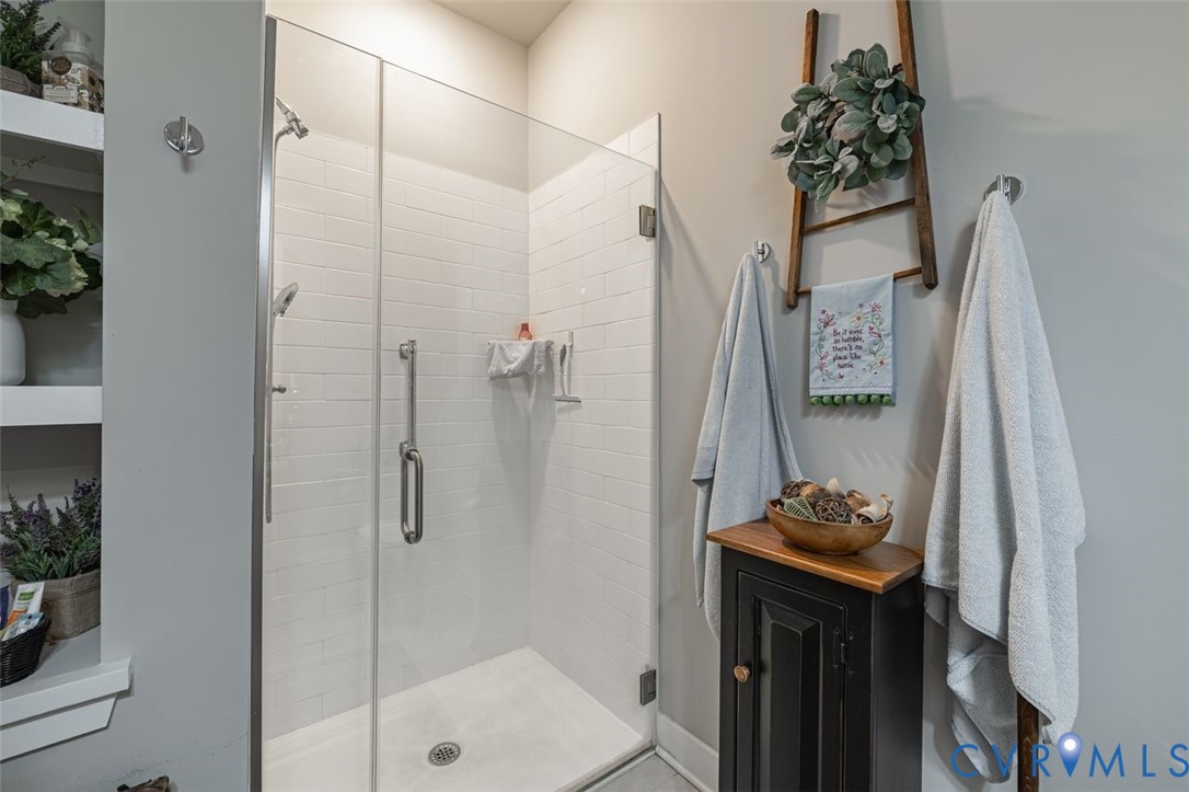 10521 Stony Bluff Drive, Unit 402 Ashland, VA 23005 - Photo 18 of 45 Bathroom featuring a stall shower
