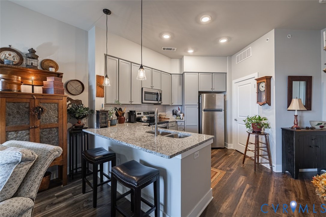 10521 Stony Bluff Drive, Unit 402 Ashland, VA 23005 - Photo 2 of 45 Kitchen featuring stainless steel appliances, gray