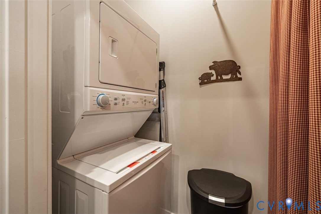 10521 Stony Bluff Drive, Unit 402 Ashland, VA 23005 - Photo 23 of 45 Laundry area featuring stacked washer / drying mac