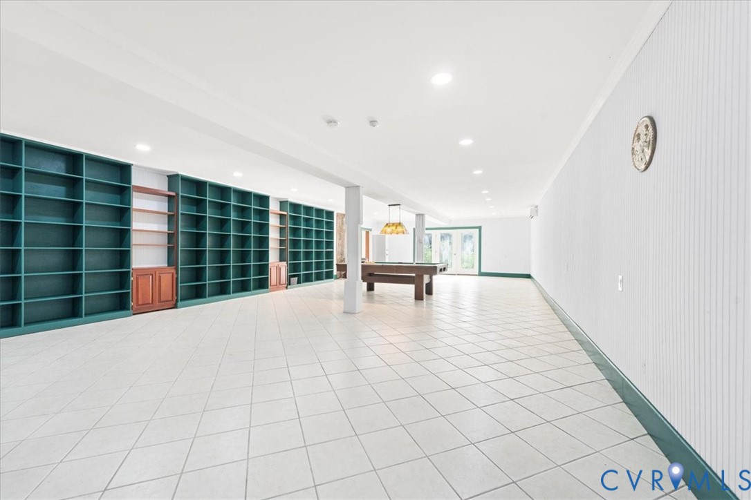 1208 Manteo Road Buckingham, VA 23921 - Photo 17 of 44 a view of empty room with wooden floor and cabinet