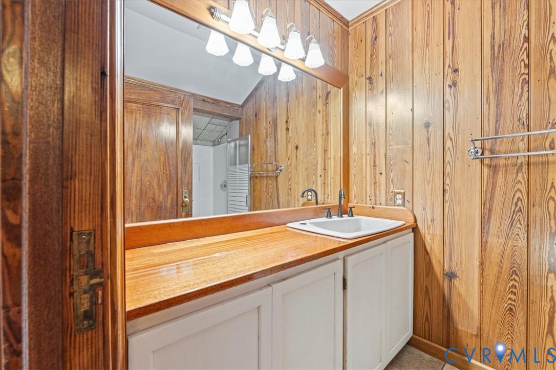 1208 Manteo Road Buckingham, VA 23921 - Photo 26 of 44 a bathroom with a sink and a mirror