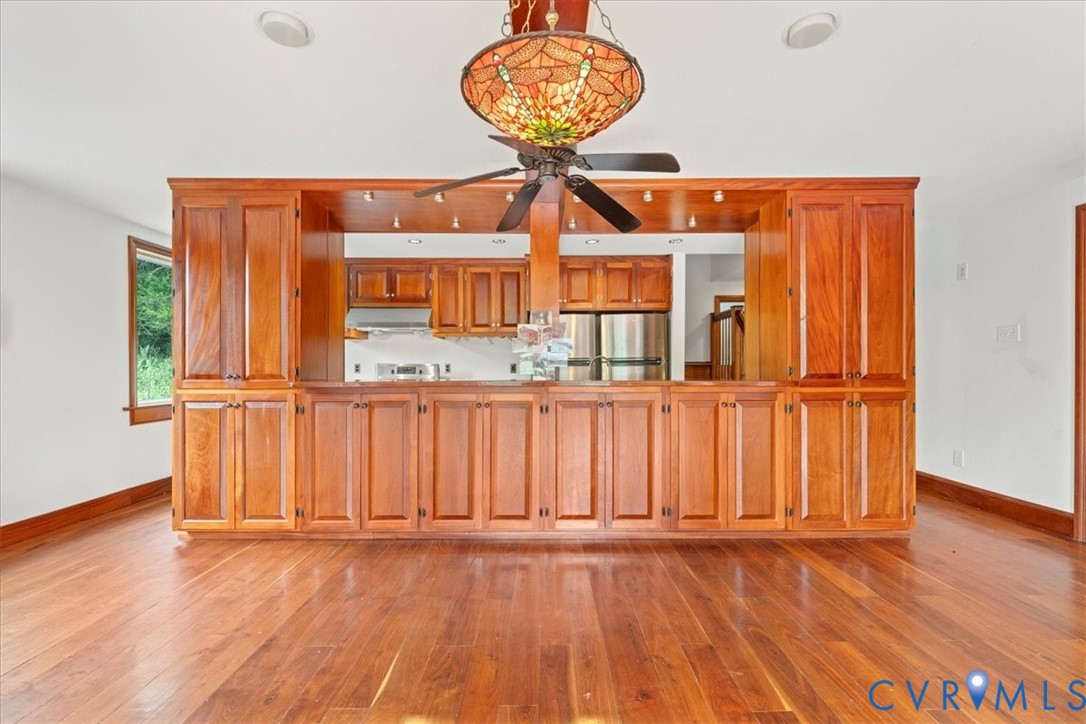 1208 Manteo Road Buckingham, VA 23921 - Photo 30 of 44 a view of a room with wooden floor and cabinet
