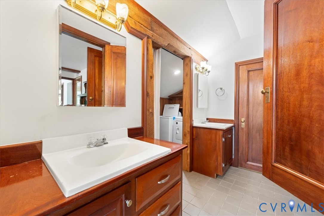 1208 Manteo Road Buckingham, VA 23921 - Photo 36 of 44 a bathroom with a sink and a mirror