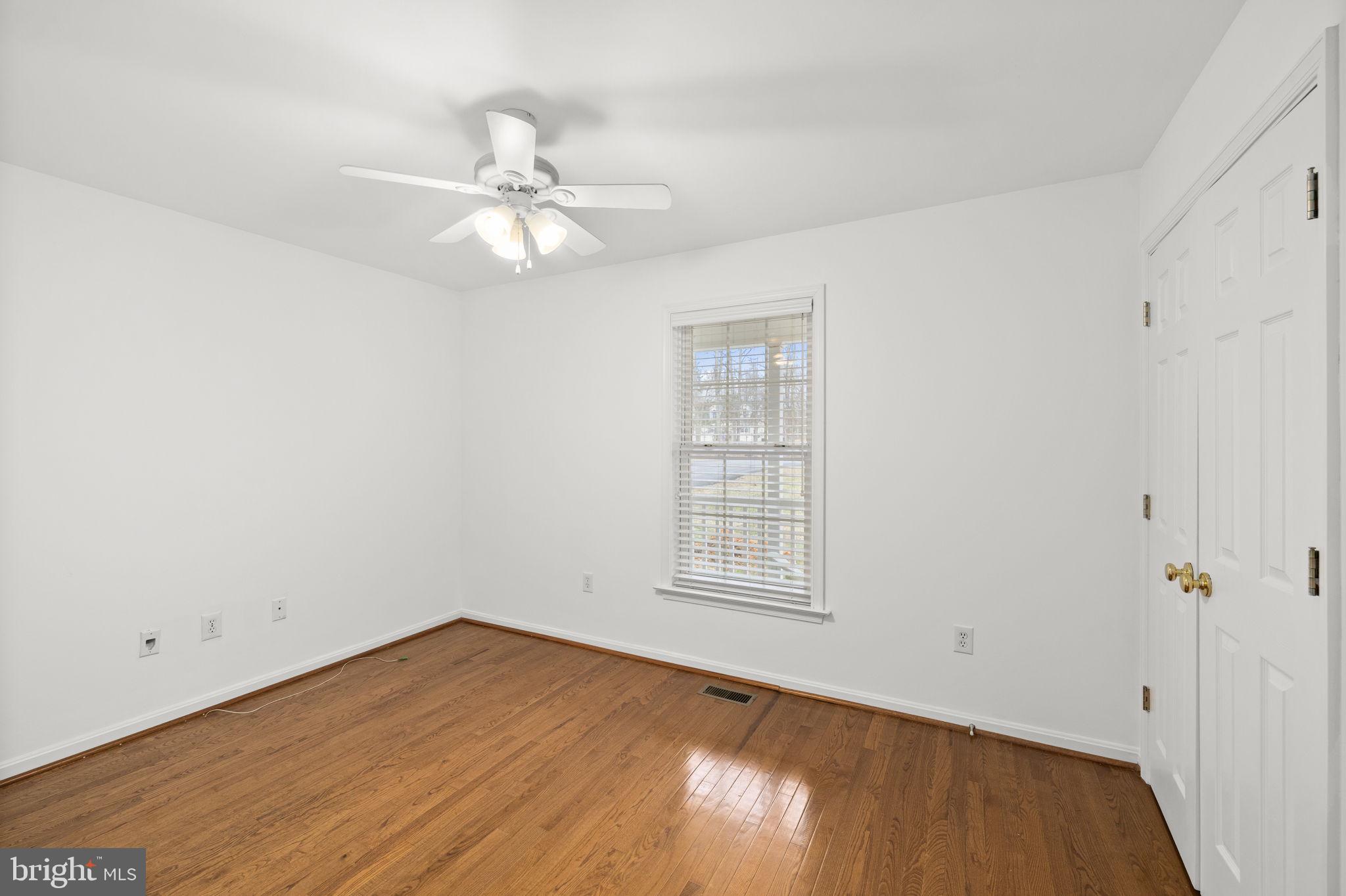 25281 Boling Lane Rhoadesville, VA 22542 - Photo 15 of 41 wooden floor in an empty room with a window