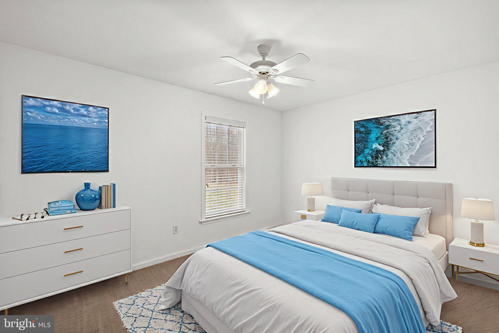 25281 Boling Lane Rhoadesville, VA 22542 - Photo 18 of 41 a bedroom with a bed and a window