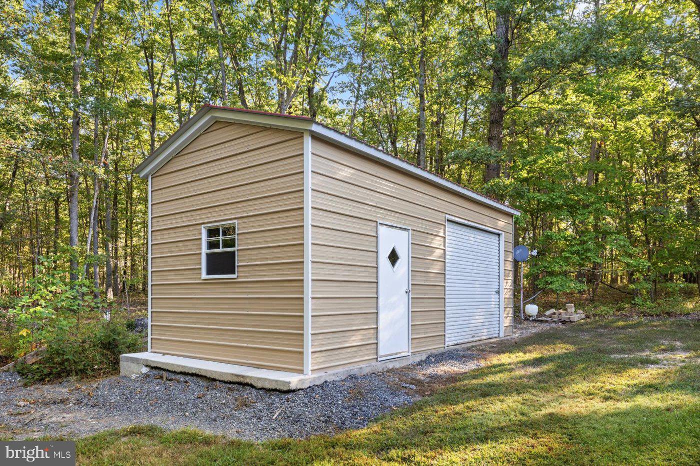 25281 Boling Lane Rhoadesville, VA 22542 - Photo 31 of 41 a view of a house with a yard