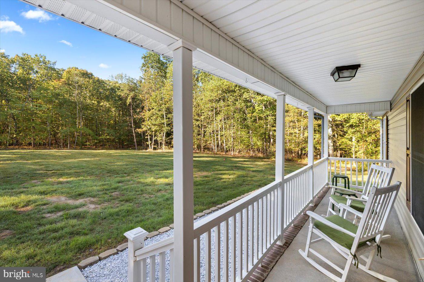 25281 Boling Lane Rhoadesville, VA 22542 - Photo 39 of 41 a view of a room with a large window and wooden floor