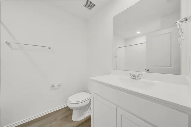 a bathroom with a shower and a bath tub