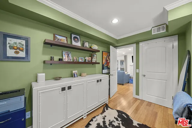 a room with furniture and a wooden floor