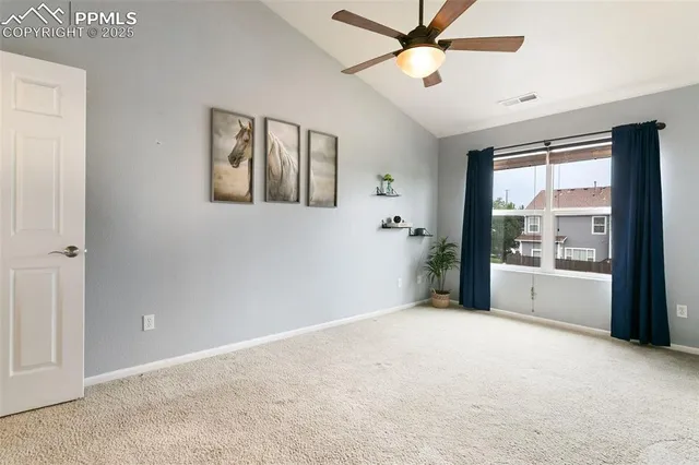 a big room with closet and windows