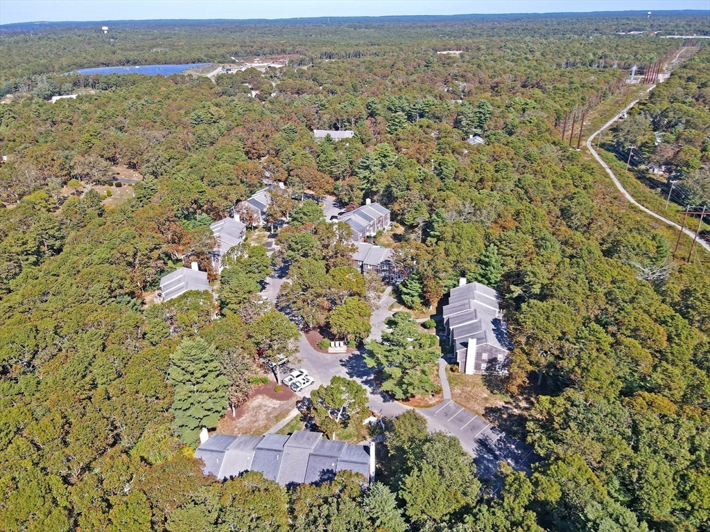 300 Falmouth Road, Unit 18E Mashpee, MA 02649 - Photo 26 of 33 an aerial view of residential house with outdoor space