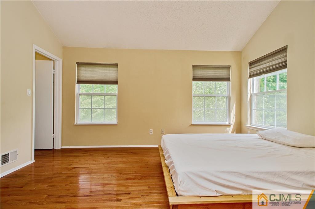 192 Nebula Road Piscataway, NJ 08854 - Photo 14 of 19 a bedroom with a bed and a window