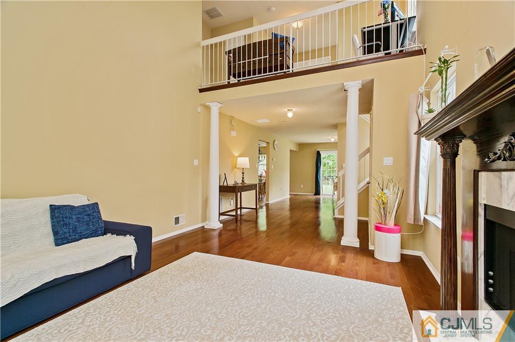 192 Nebula Road Piscataway, NJ 08854 - Photo 4 of 19 a living room with furniture and a flat screen tv