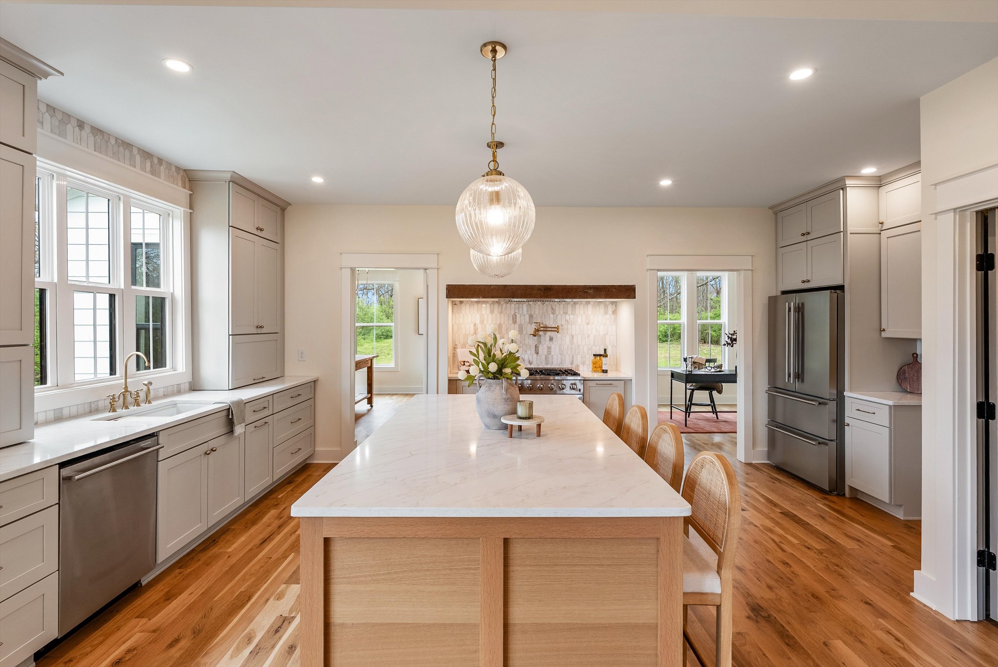1629 Cairo Road Gallatin, TN 37066 - Photo 11 of 51 a large kitchen with kitchen island a large counter top space a sink appliances and cabinets
