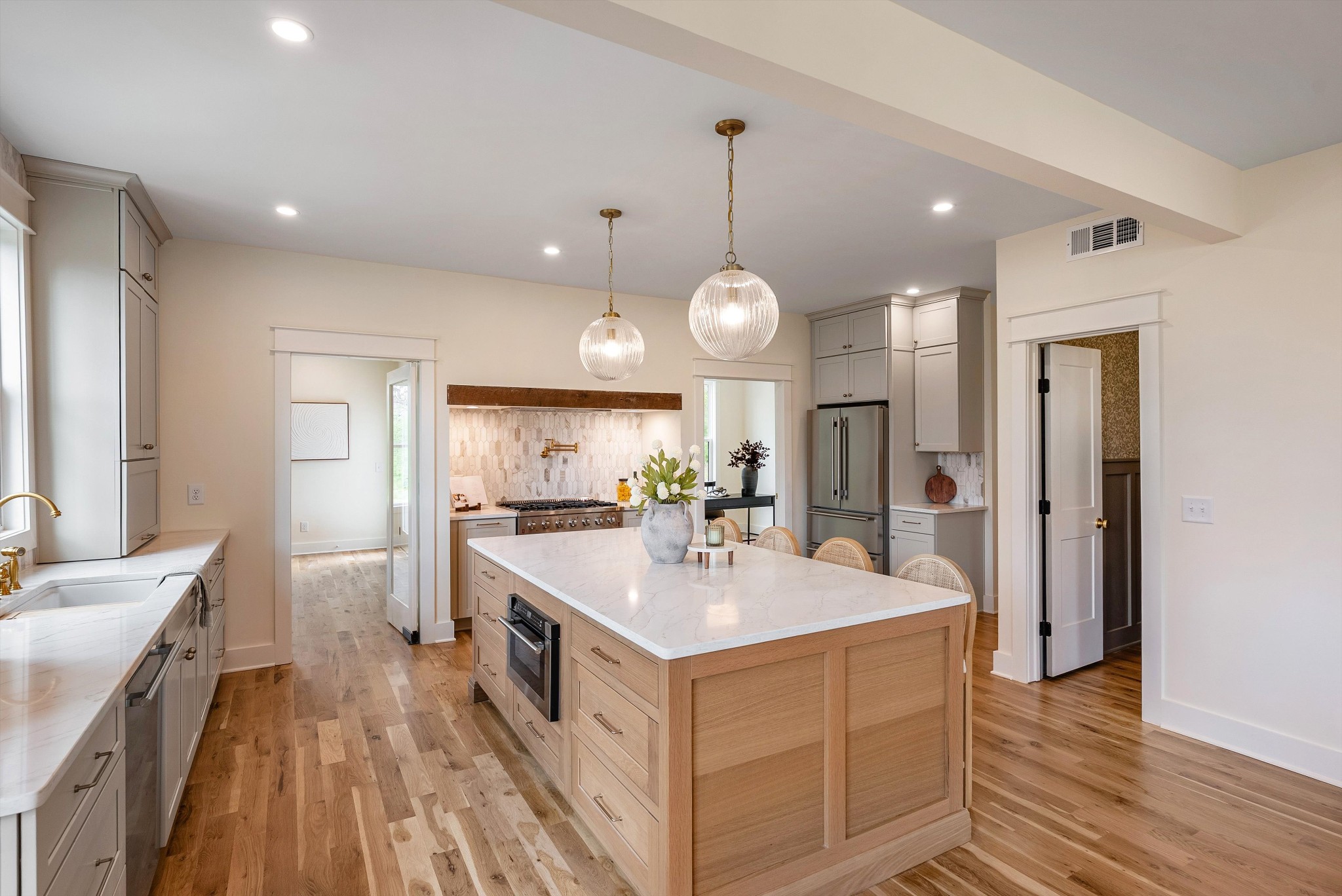 1629 Cairo Road Gallatin, TN 37066 - Photo 13 of 51 a kitchen with a sink and wooden floor