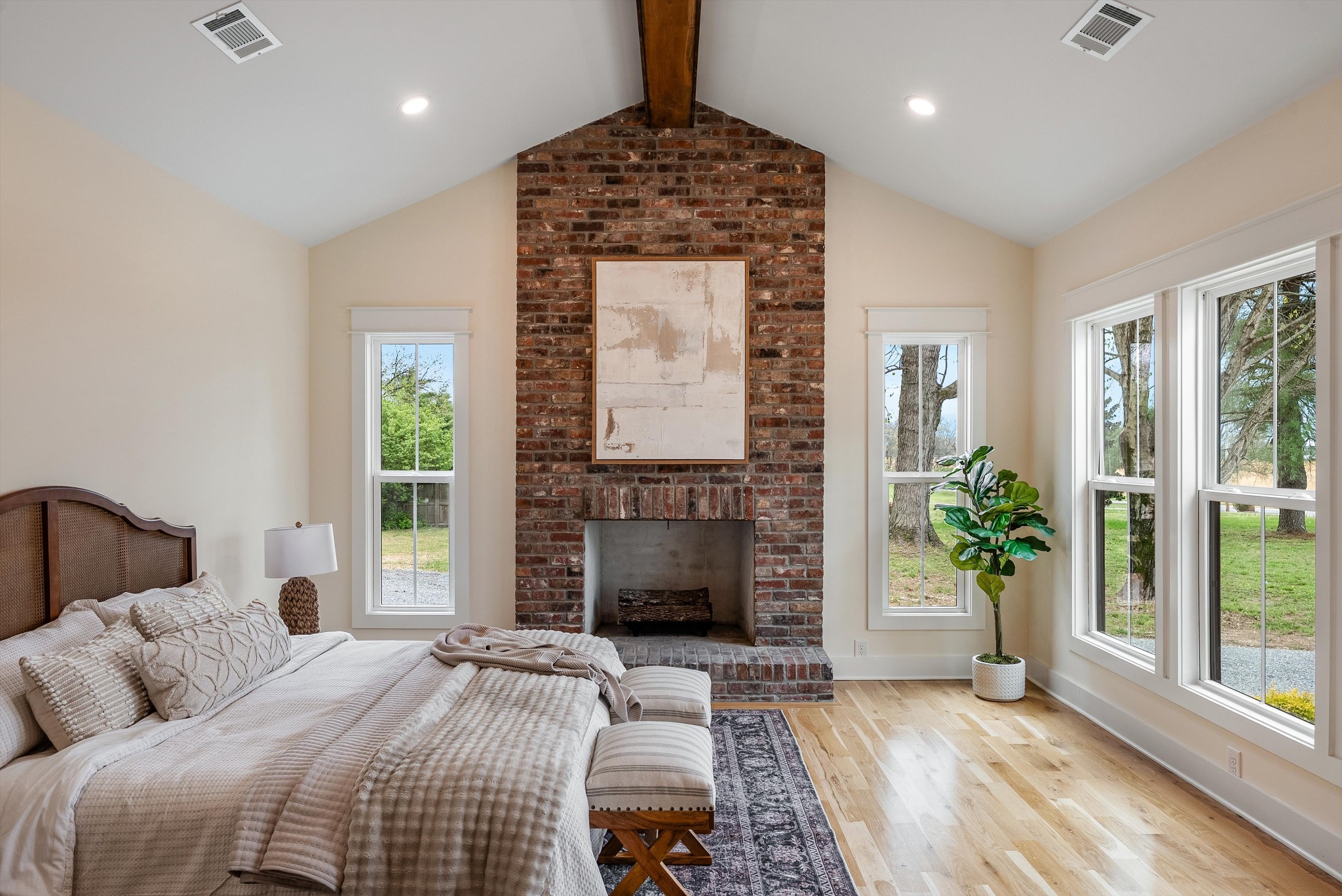 1629 Cairo Road Gallatin, TN 37066 - Photo 25 of 51 a bedroom with a bed and a fireplace